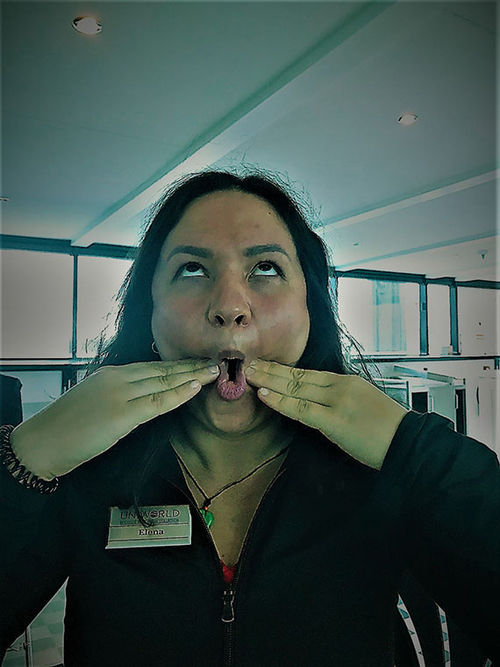 Well-being coach Elena Nejloveanu demonstrates “face yoga” to members of the staff. Well-being coach Elena Nejloveanu demonstrates “face yoga” to members of the staff.