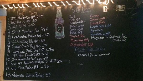 At the Brewster River Pub and Brewery, a common sight in Vermont: The chalkboard of beers on tap, many of them local. At the Brewster River Pub and Brewery, a common sight in Vermont: The chalkboard of beers on tap, many of them local.