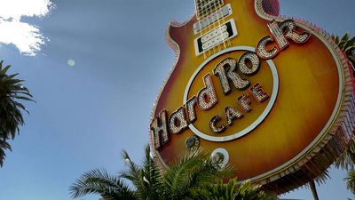 The massive neon guitar that marked the Hard Rock Cafe has a new home at the Neon Museum.