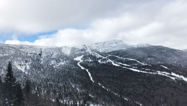 A view of Stowe and Mount Mansfield from the ski resort's Fourruner Quad chair lift. A view of Stowe and Mount Mansfield from the ski resort's Fourruner Quad chair lift.