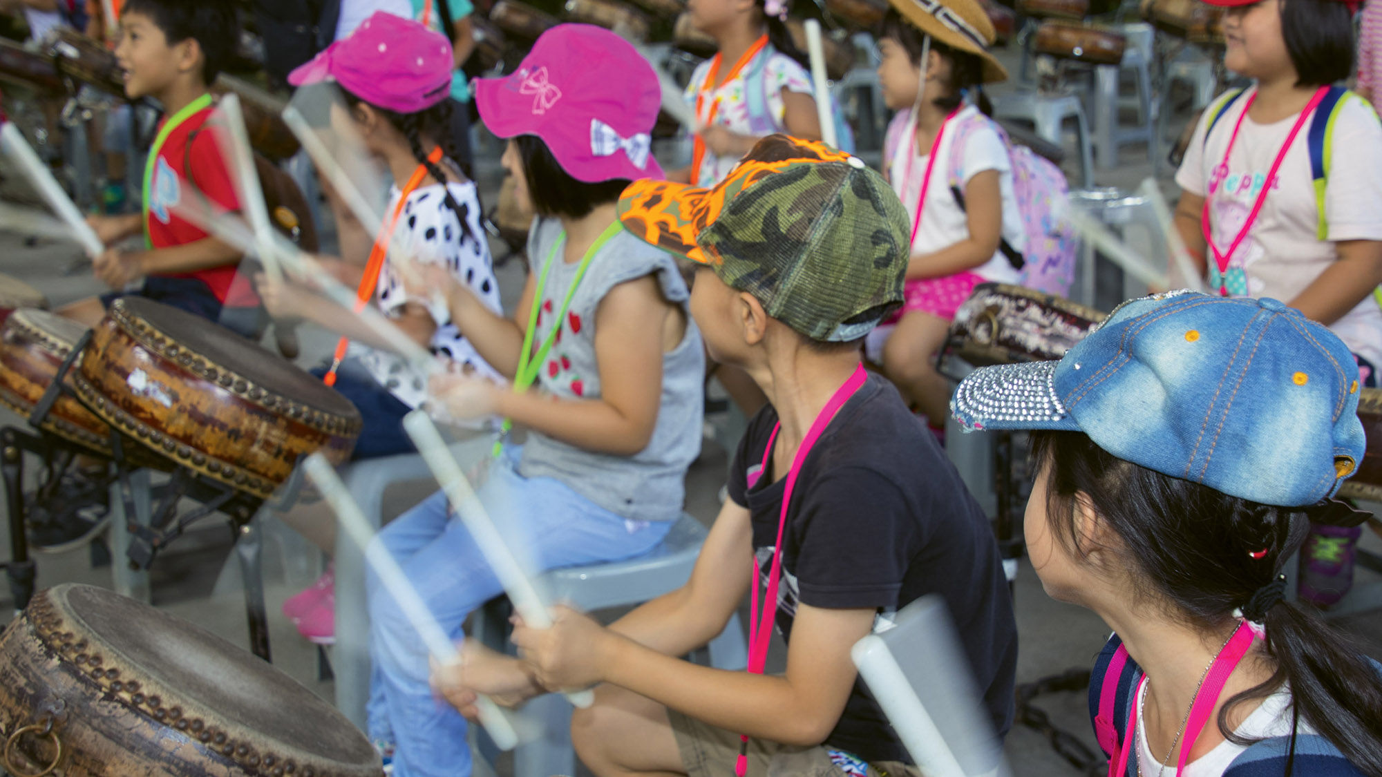 Children get a drum lesson at the Ten Drum Cultural Village in Tainan.