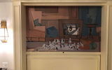 Artwork inspired by Disney's "101 Dalmatians" in a model of a deluxe studio room.