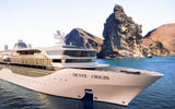 At a presentation at the Seatrade Cruise Global conference in Miami Beach, Silversea Cruises unveiled new details about the Silver Origin, the 100-passenger ship it is building at a Dutch shipyard for use in the Galapagos Islands. Silversea said it is the cruise line's first ever destination-specific ship. It is scheduled to start sailing in 2020. Many interior spaces were detailed for the first time at the convention. Bright, colorful motifs and regional materials will accentuate the design. Silver Origin's public spaces were designed by HBA Miami, while GEM -- Design for Cruise Ships, the team behind the interior design of Silver Muse, oversaw the interior design of the ship's suites.