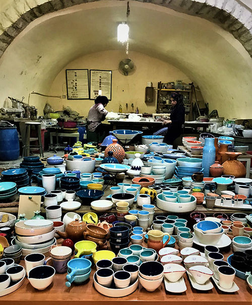 Ceramics for sale at Iraq al-Amir Women’s Association. The women in the back are creating ceramic leaves, to be glazed and painted. Ceramics for sale at Iraq al-Amir Women’s Association. The women in the back are creating ceramic leaves, to be glazed and painted.