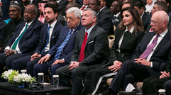 President Muhammadu Buhari of Nigeria, President Ismail Omar Guelleh of Djibouti, Crown Prince Hussein bin Abdullah of Jordan, President Mahmoud Abbas of the Palestinian Authority, King Abdullah II of Jordan, Queen Rania of Jordan and Klaus Schwab, executive chairman of the World Economic Forum, listen to presentations about tourism in Jordan at a regional WEF conference on the Middle East and Africa in early April 2019.