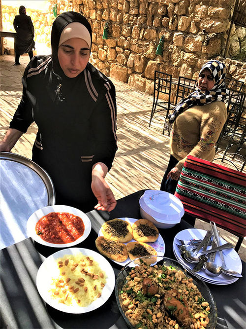 Lunch is served at Iraq al-Amir Women’s Association.