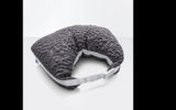 The Sleep Number Travel Pillow is composed of a blended fill of memory foam pieces and premium down fibers covered by a washable artificial fabric, this on-the-go sleep aid boasts an ergonomically curved shape to enhance comfort.