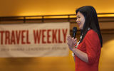 Delta Vacations CEO Jennie Ho, presenting a "TW Talks" segment at the Forum. She and Pleasant Holiday's Richards; David Hu, CEO of Classic Vacations; and Ray Snisky, chief commercial officer, vacations, for Apple Leisure Group, used their stage time to tell the audience how a famous quotation affected their lives.