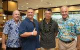 From left: Outrigger Hotels & Resorts Bruce Schneider, vice president operations for condo resort and timeshare divisions, and Bob Froio, Outrigger's director of sales and marketing, North America with Hu and Dale Carstensen, director of sales and marketing for Starwood.
