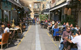 Tel Avivians enjoy lunch on a pedestrian street in Jaffa, the southern and oldest part of the city.