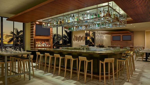 The Kuhio Beach Grill, a bourbon bar and restaurant overlooking the beach, opened at the resort in 2017. The Kuhio Beach Grill, a bourbon bar and restaurant overlooking the beach, opened at the resort in 2017.
