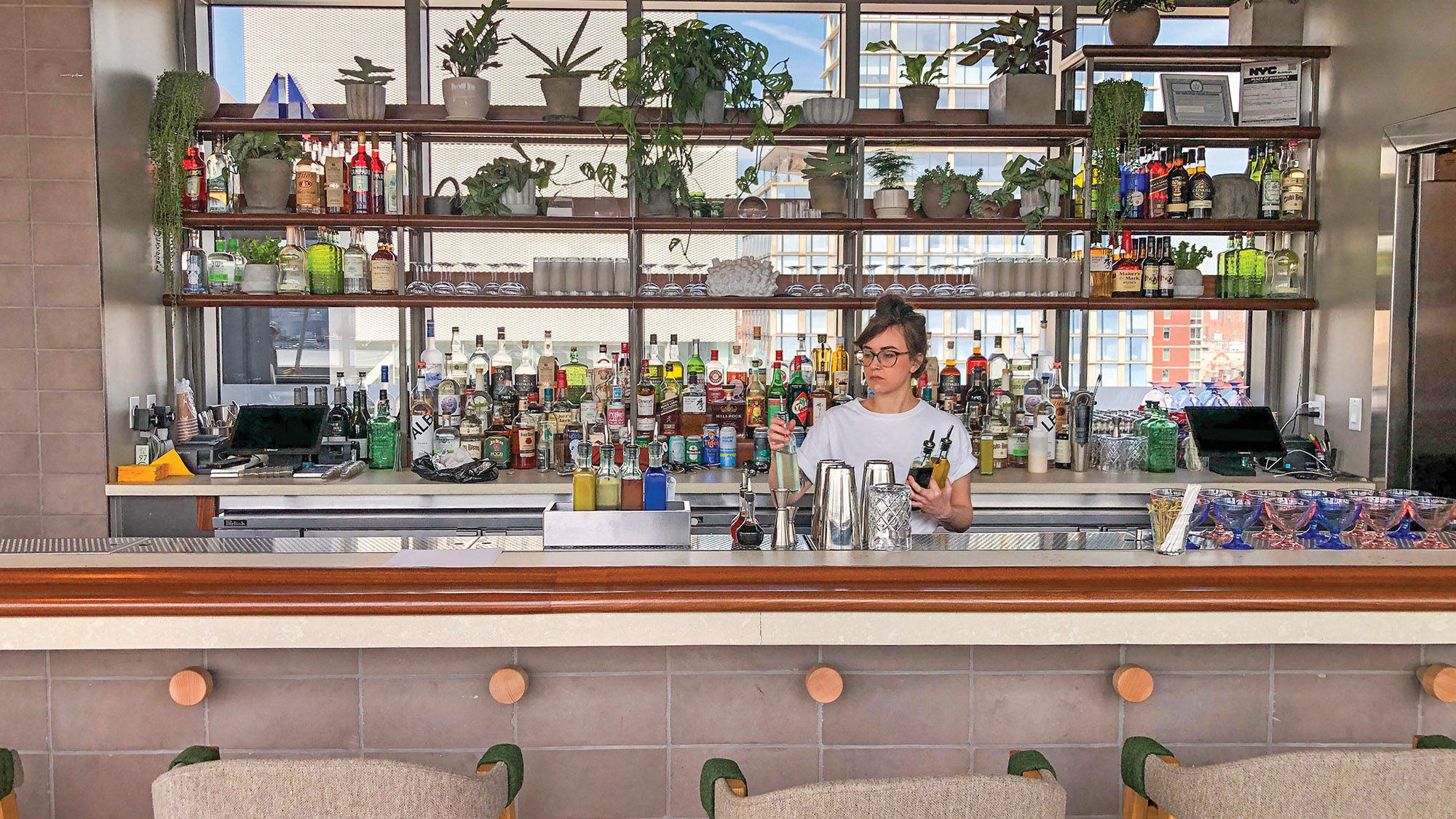 Bartenders at Last Light, Sister City’s indoor-outdoor bar.