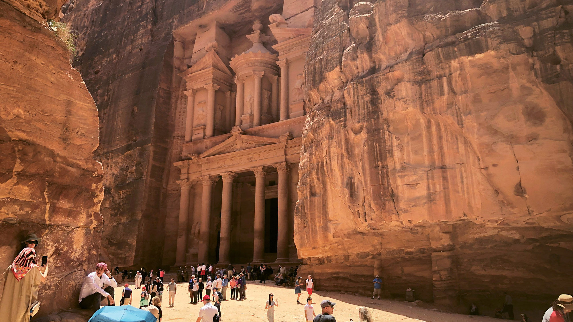 The Treasury, which dates to the first century, is the most famous monumental structure in Petra. It sits at the end of a long slot canyon called the Siq.