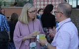 Jill Cruse with Olivia Travel and Gregg Kaminsky of R Family Vacations talk over cocktails at GTM West's closing reception.