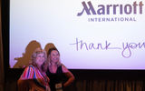 Lorrie Ortega, winner of a Westin Heavenly Bed, poses with Carina Reidt of Marriott International during the Travel Advisor Orientation, which Marriott sponsored.