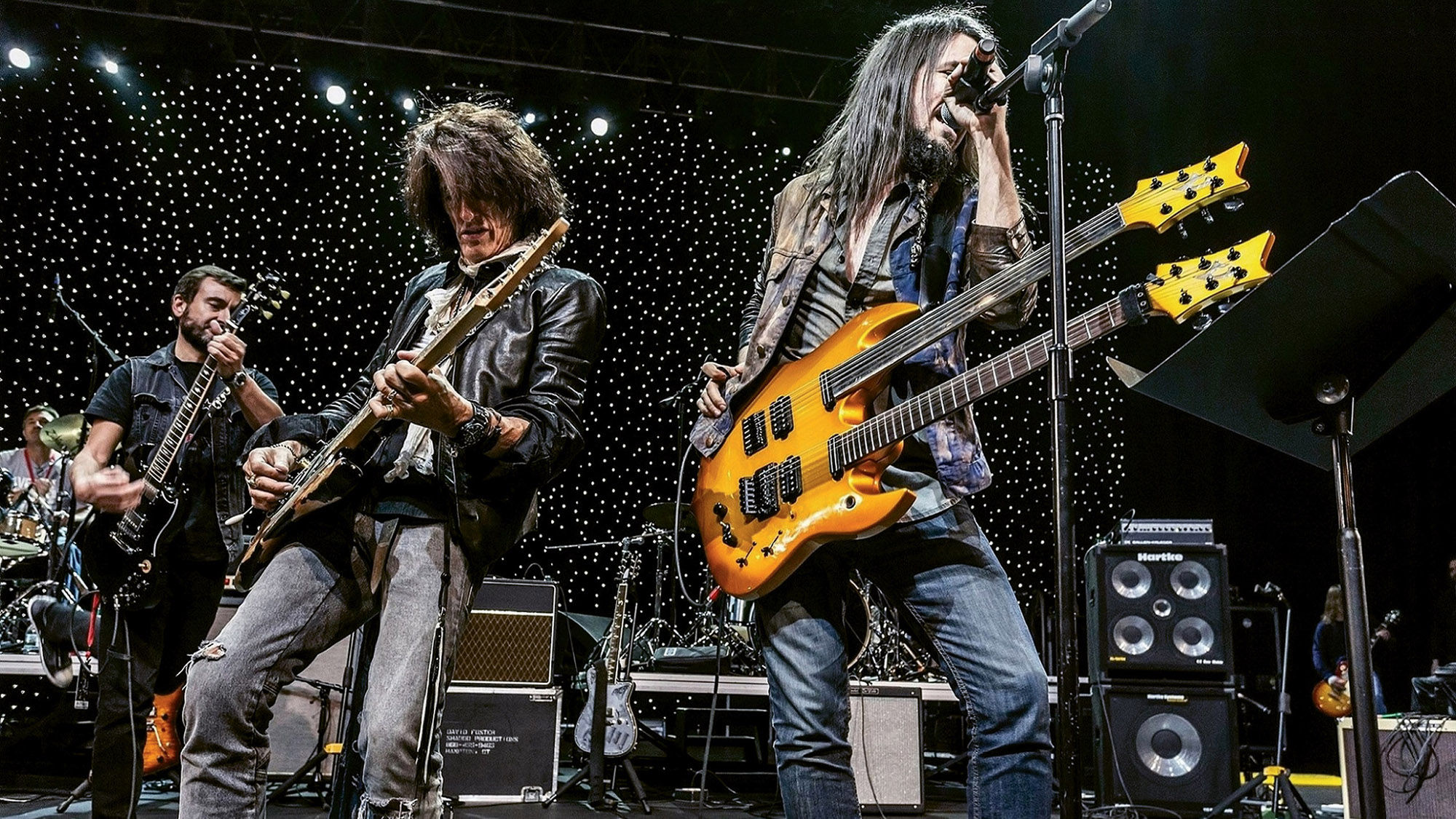Aerosmith guitarist Joe Perry, center, will be one of the headliners at the Rock ’n’ Roll Fantasy Camp in June.