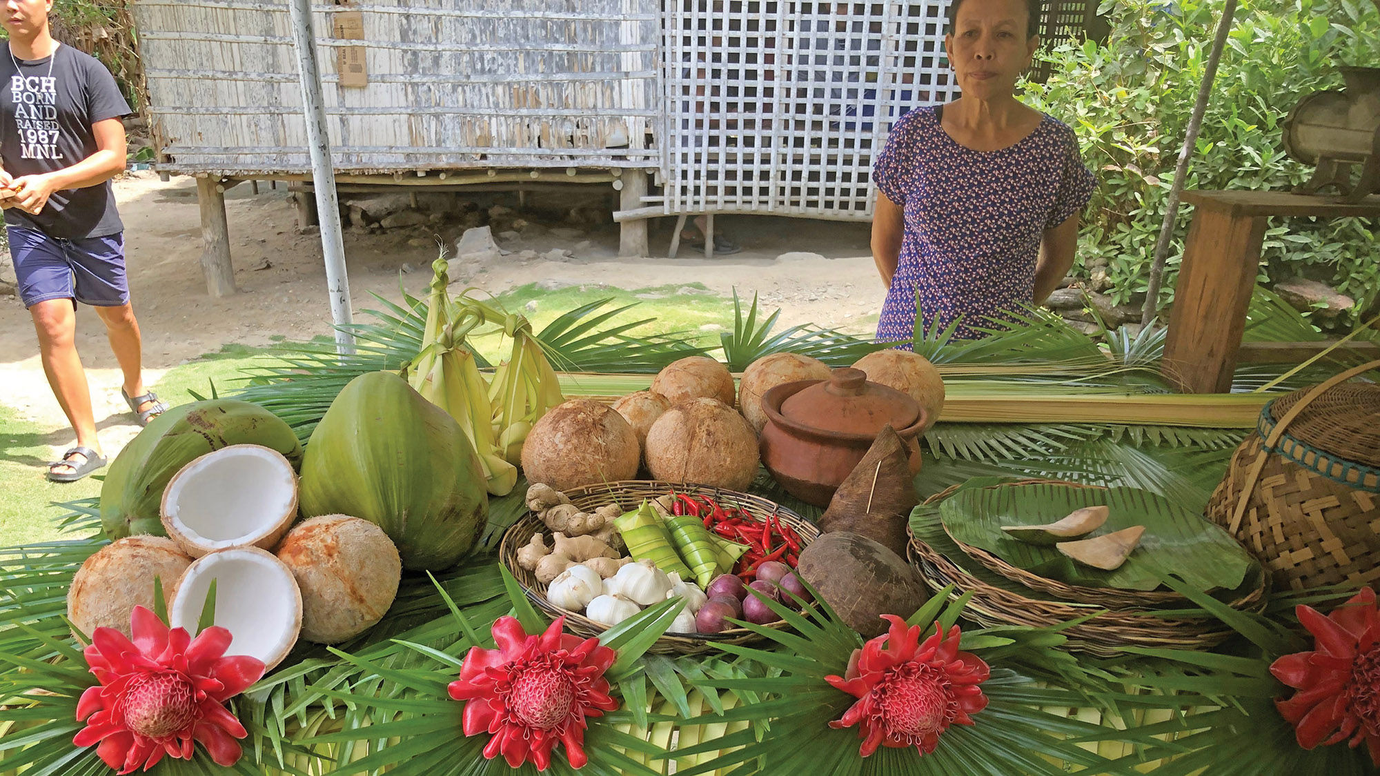 A table setting at a Romblon country house where the specialty is a prawn and coconut dish wrapped in banana leaves.