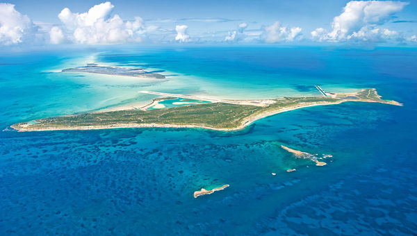 Ambergris Cay is an 18-minute flight from Providenciales in the Turks and Caicos. Ambergris Cay is an 18-minute flight from Providenciales in the Turks and Caicos.