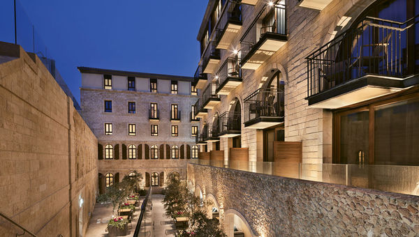 Room balconies overlook the various courtyards within the Setai Tel Aviv’s walls.