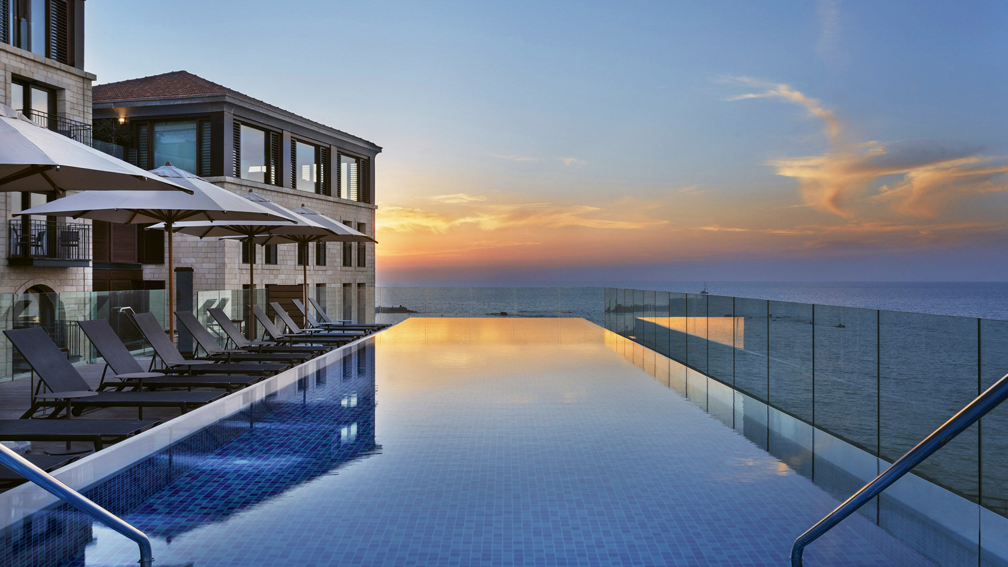 The Setai’s pool deck offers panoramic views of the Mediterranean coast and the Tel Aviv skyline.