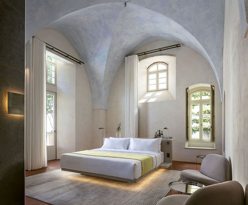 The rooms in the original building at the Jaffa have arched ceilings and tall windows and doors.