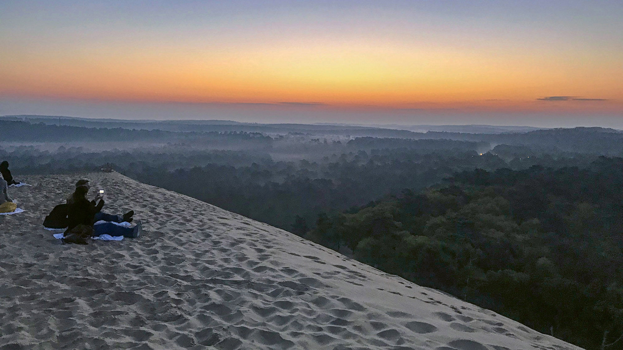 Passengers from Uniworld’s Bon Voyage take in the sunrise from Europe’s tallest sand dune, on the Atlantic coast of France. The excursion is part of Uniworld’s Masterpiece collection.