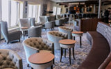 The Alchemy Bar on the Carnival Sunrise., the place for craft cocktails and people watching (Correction: An earlier version of this caption incorrectly said that the Alchemy was new to the ship; it predates the Sunrise drydock).