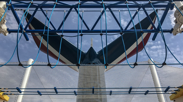 The distinctive Carnival Cruise Line funnel on the Carnival Sunrise, the former Triumph, as seen from below its new ropes course. The ship underwent a nearly $200 million makeover that added multiple dining and entertainment options to the ship -- and changed its name.