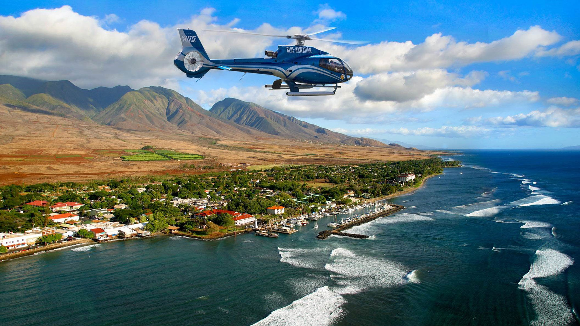 The "Maui by Land, Air and Sea" package at the Sheraton Maui Resort and Spa includes a helicopter tour with Blue Hawaiian.