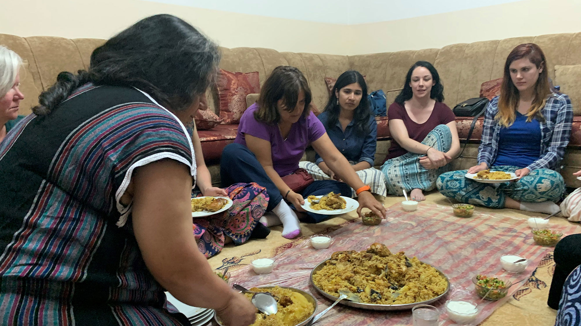 Having dinner and tea with the women and children who live in a traditional multi generational Jordanian household.