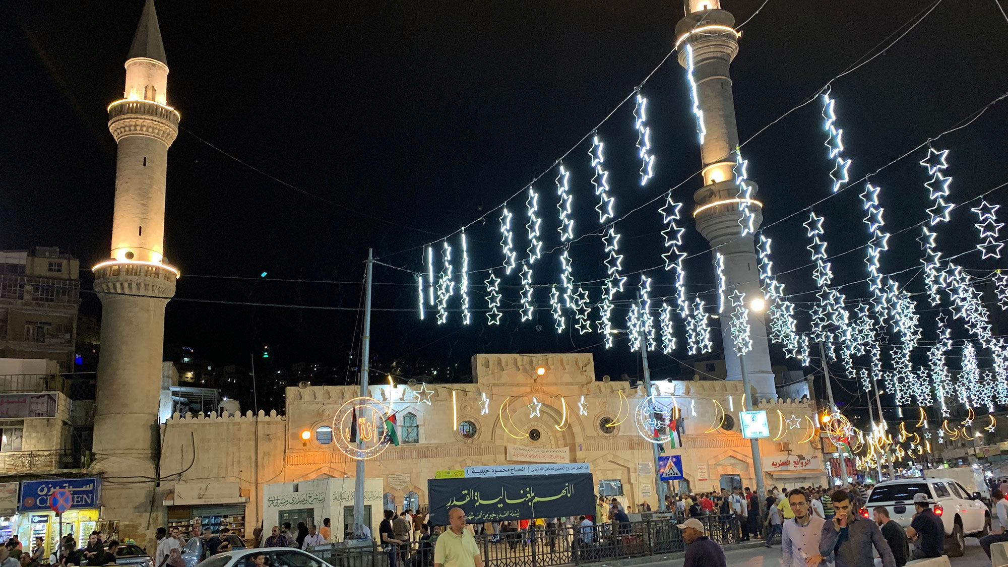 The streets and mosques of Amman are lit up at night in celebration of Ramadan.