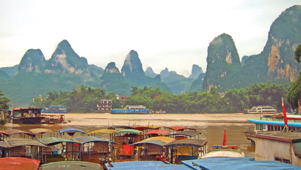 Boats on the Li River in Yangshuo County in Guangxi. Boats on the Li River in Yangshuo County in Guangxi.