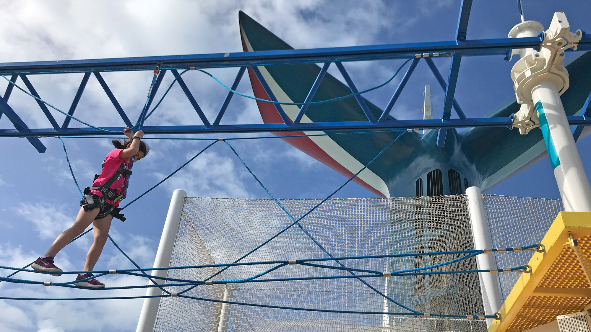 The new ropes course on the Carnival Sunrise provides a rewarding challenge on the SportsDeck.