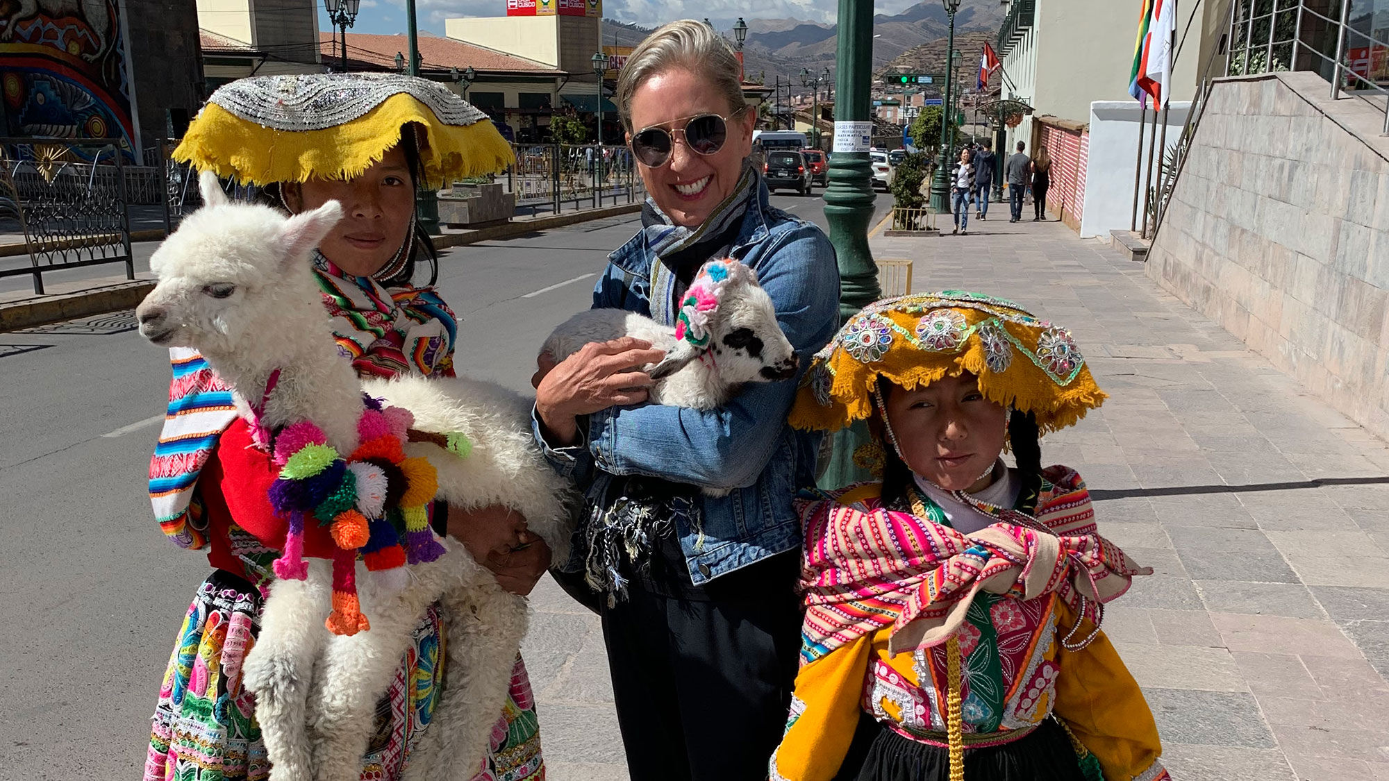 Animal lover and Travel Weekly senior editor Jeri Clausing pays to get her picture taken with alpacas without realizing the negative impacts of engaging with the women who parade the animals around Cusco for photo opportunities.