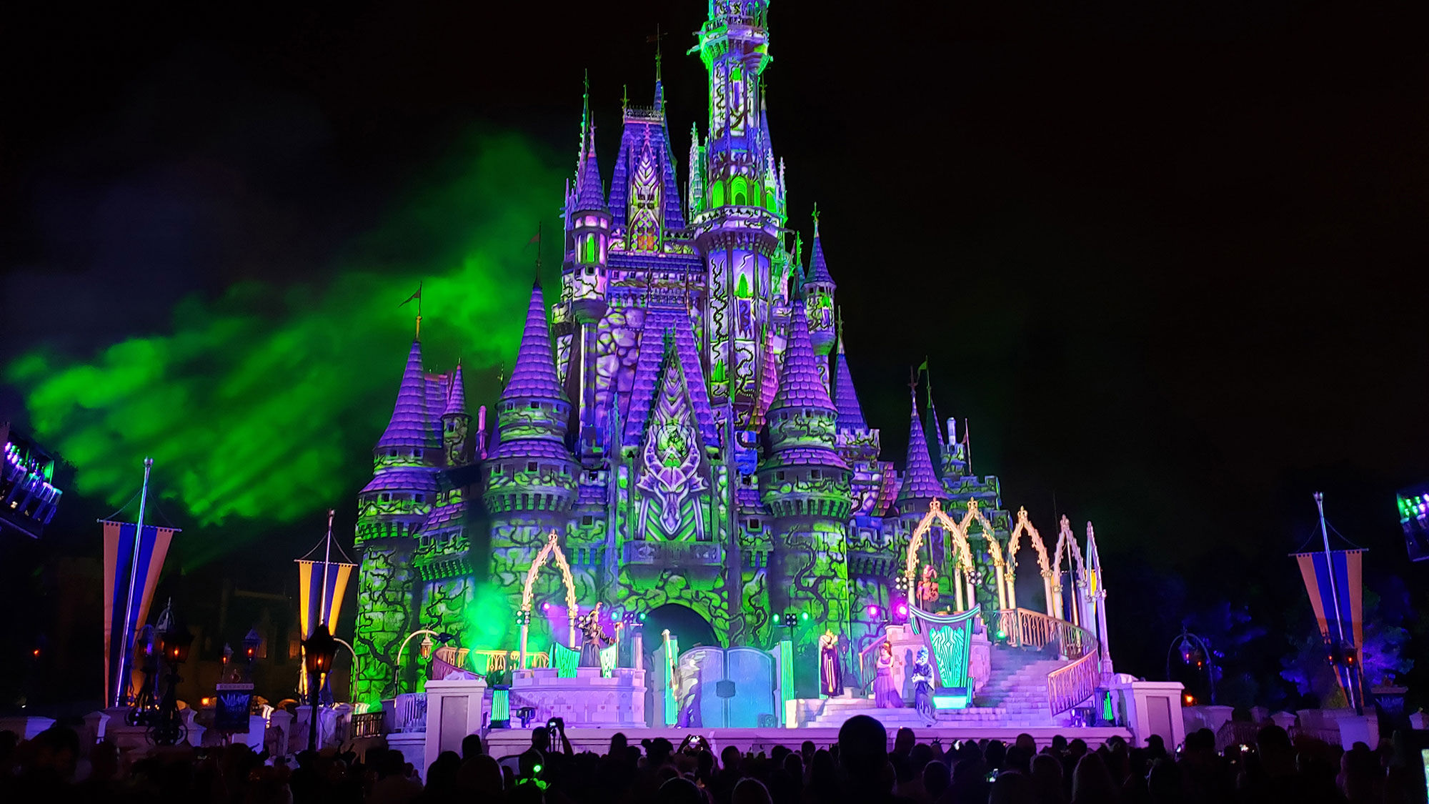 Disney's baddies redecorate Cinderella Castle to their own tastes during the Villains After Hours stage show.