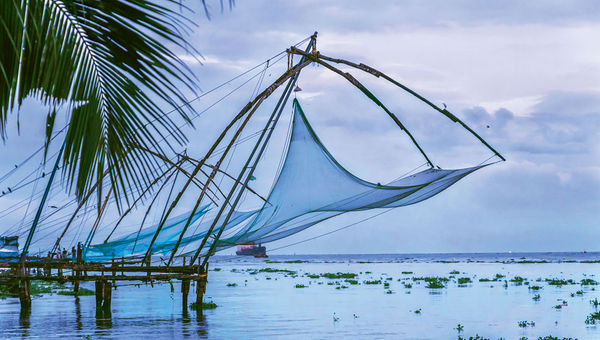 Cantilevered Chinese fishing nets, the unofficial emblem of Kerala, in the Fort Kochi district of Kochi, the state’s most densely populated city. Cantilevered Chinese fishing nets, the unofficial emblem of Kerala, in the Fort Kochi district of Kochi, the state’s most densely populated city.