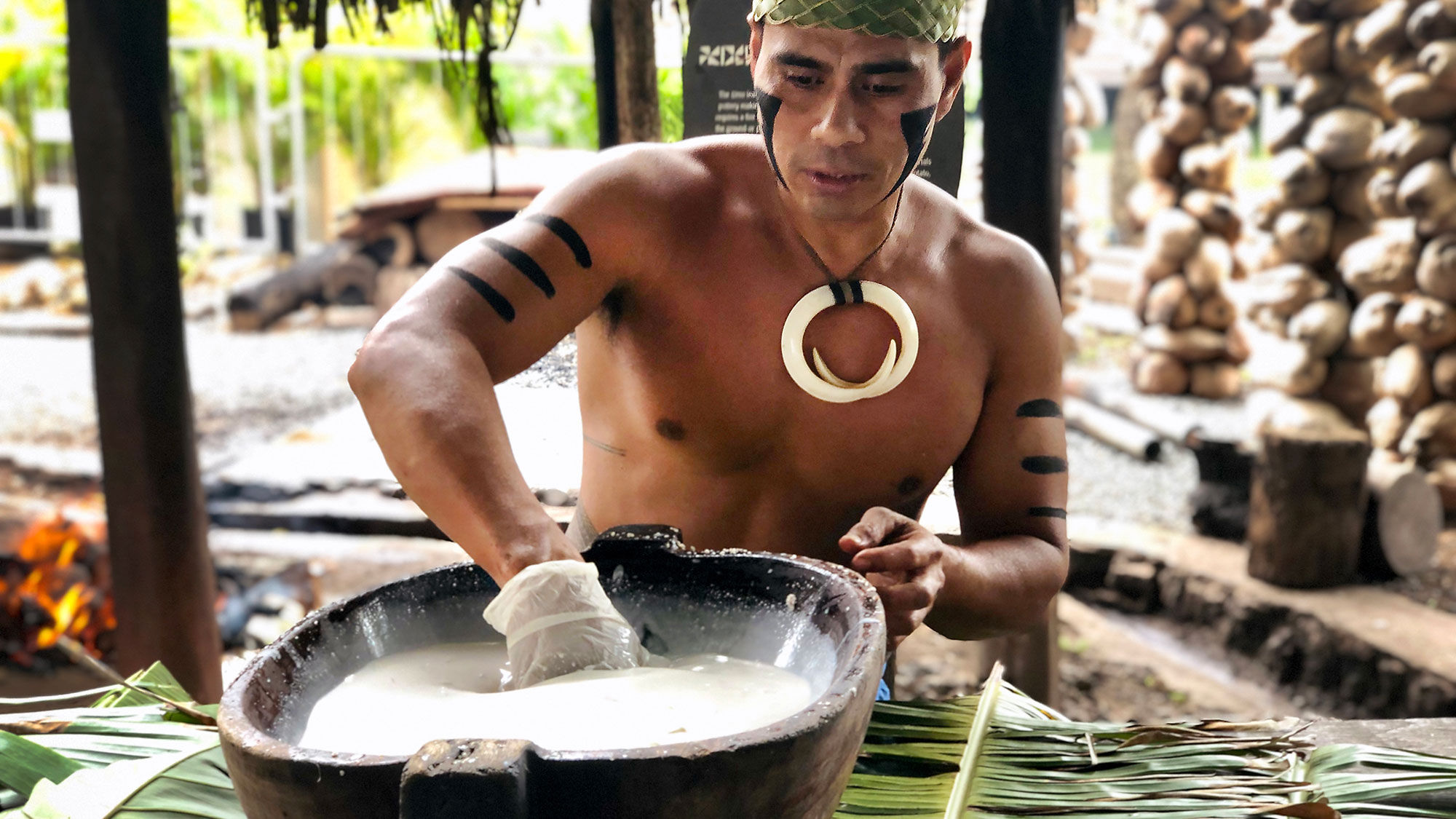 Creasepaul Tofa demonstrates how to make the Samoan dish of palusami.