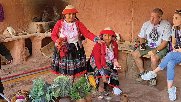 Women from a weaving cooperative that G Adventures helped create in the Peruvian village of Ccaccaccollo demonstrate how they dye wool using natural products. Women from a weaving cooperative that G Adventures helped create in the Peruvian village of Ccaccaccollo demonstrate how they dye wool using natural products.