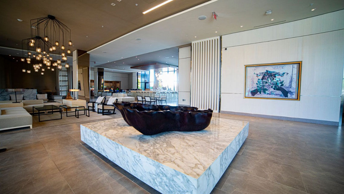 The lobby of AC Hotel Kingston, which displays Jamaican art.