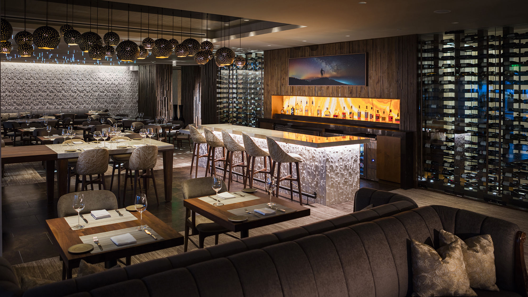 Interior of the dining room and bar at Ario at the JW Marriott Marco Island Beach Resort.