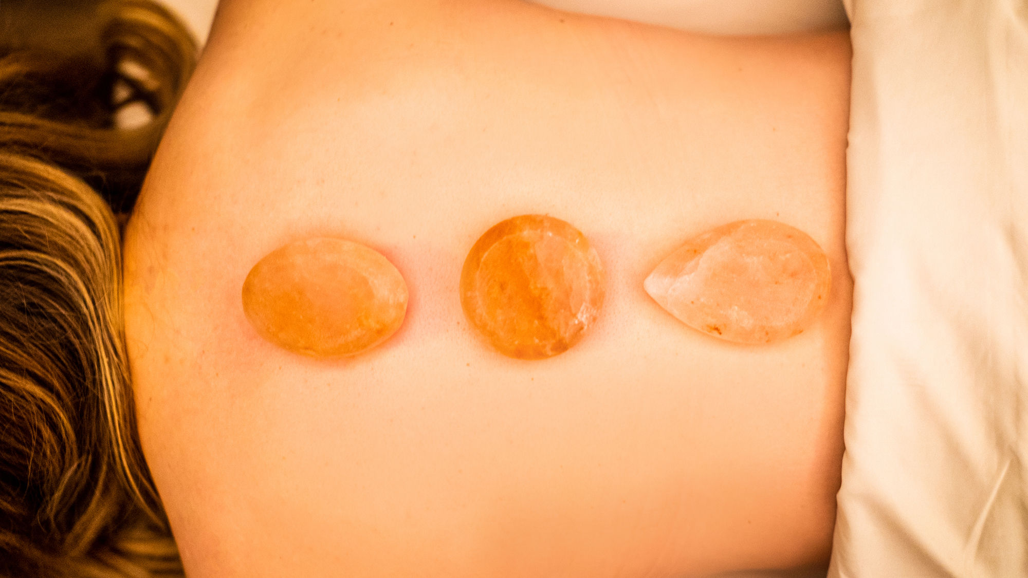 The "Salty Piece of Land" salt stone massage at the new St. Somewhere Spa at Margaritaville Orlando Resort.