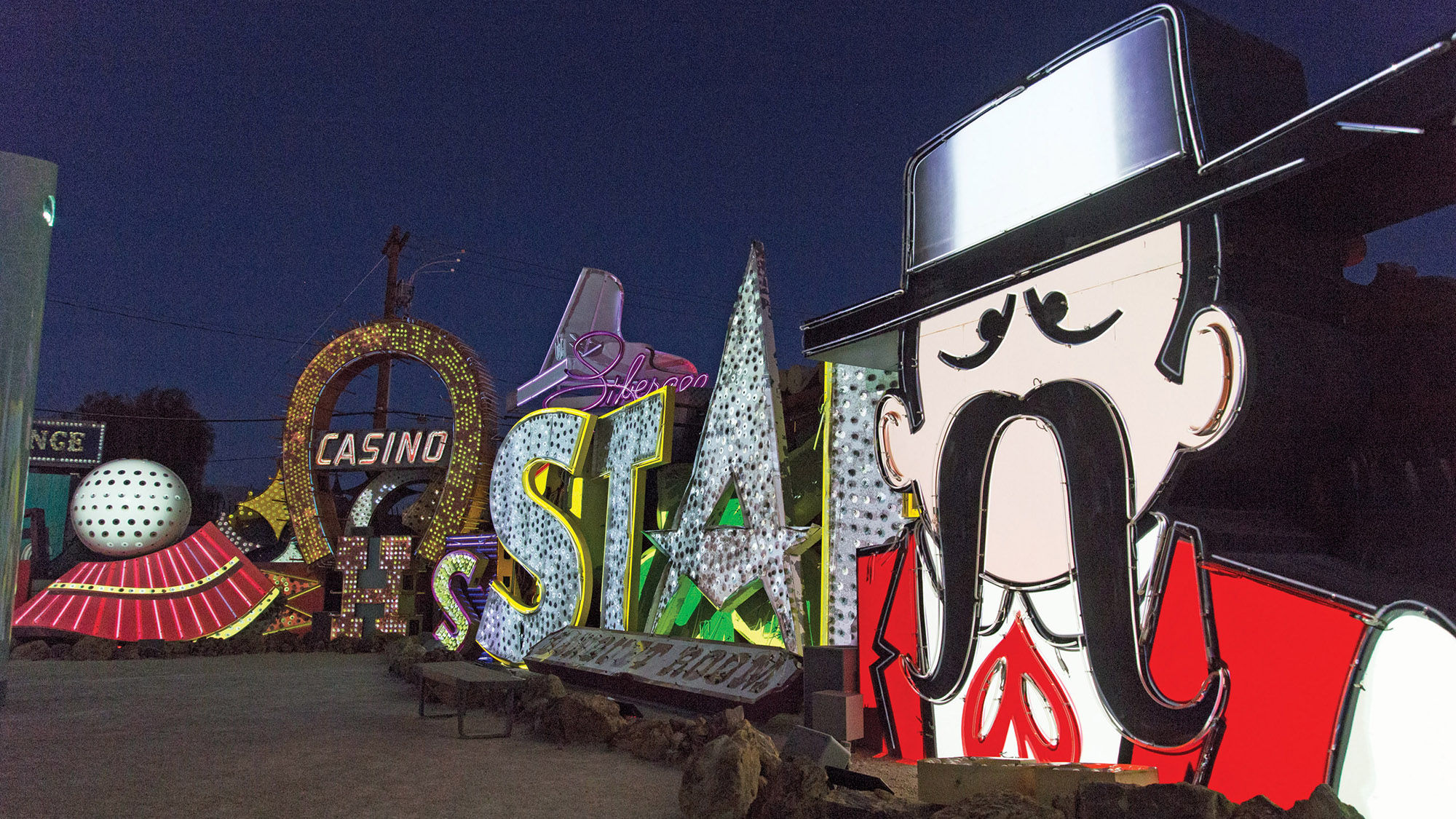 Signs from the Las Vegas of yesteryear are brought back to luminous life during “Brilliant!” at the Neon Museum.