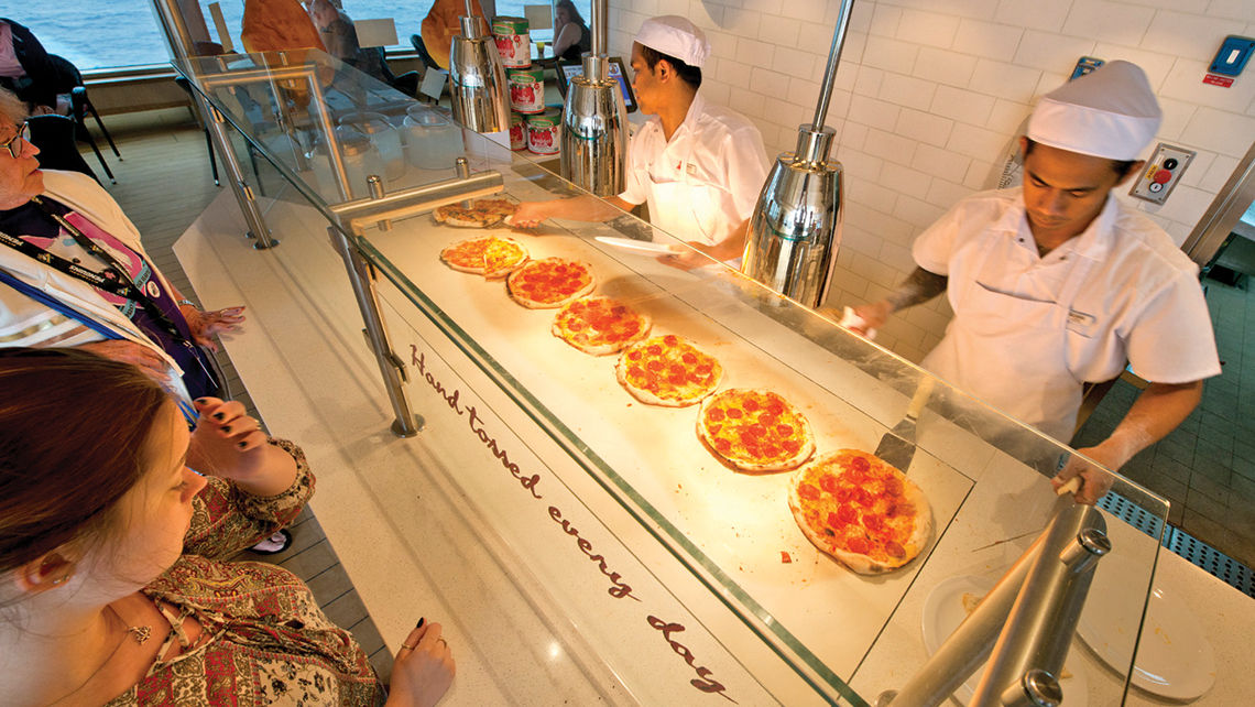 The Pizzeria del Capitano pizzeria on the Carnival Sunrise. Guests can order pizza at the counter, or from the Carnival Hub app for delivery anywhere on the ship, for a $5 fee. Photo via Carnival Cruise Line.