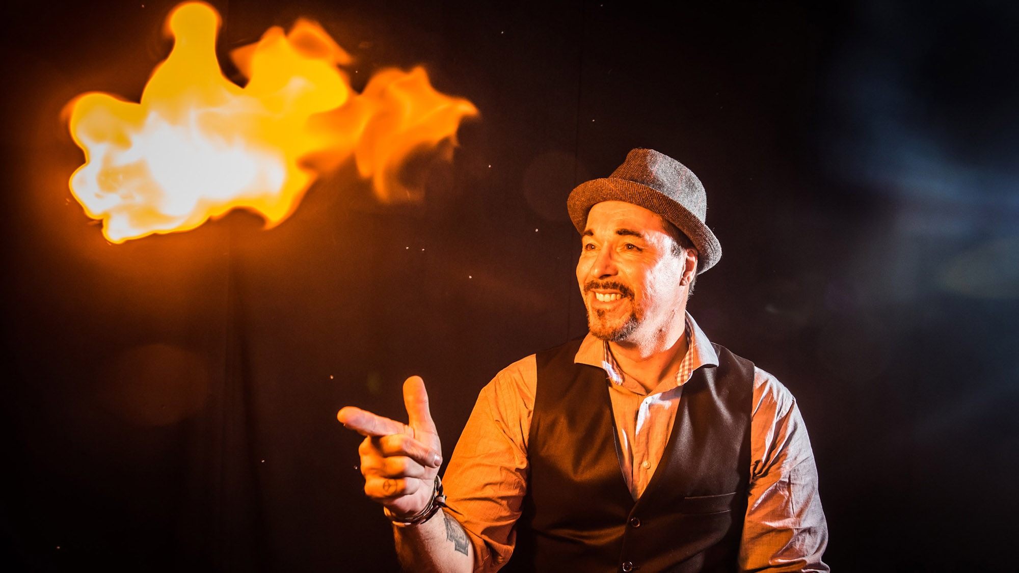Magician Tony Brent entertains audiences at WonderWorks Orlando's magic and dinner show.