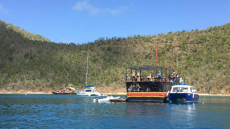 The Willy T floating bar and restaurant, anchored off the Bight near Norman Island in the British Virgin Islands.