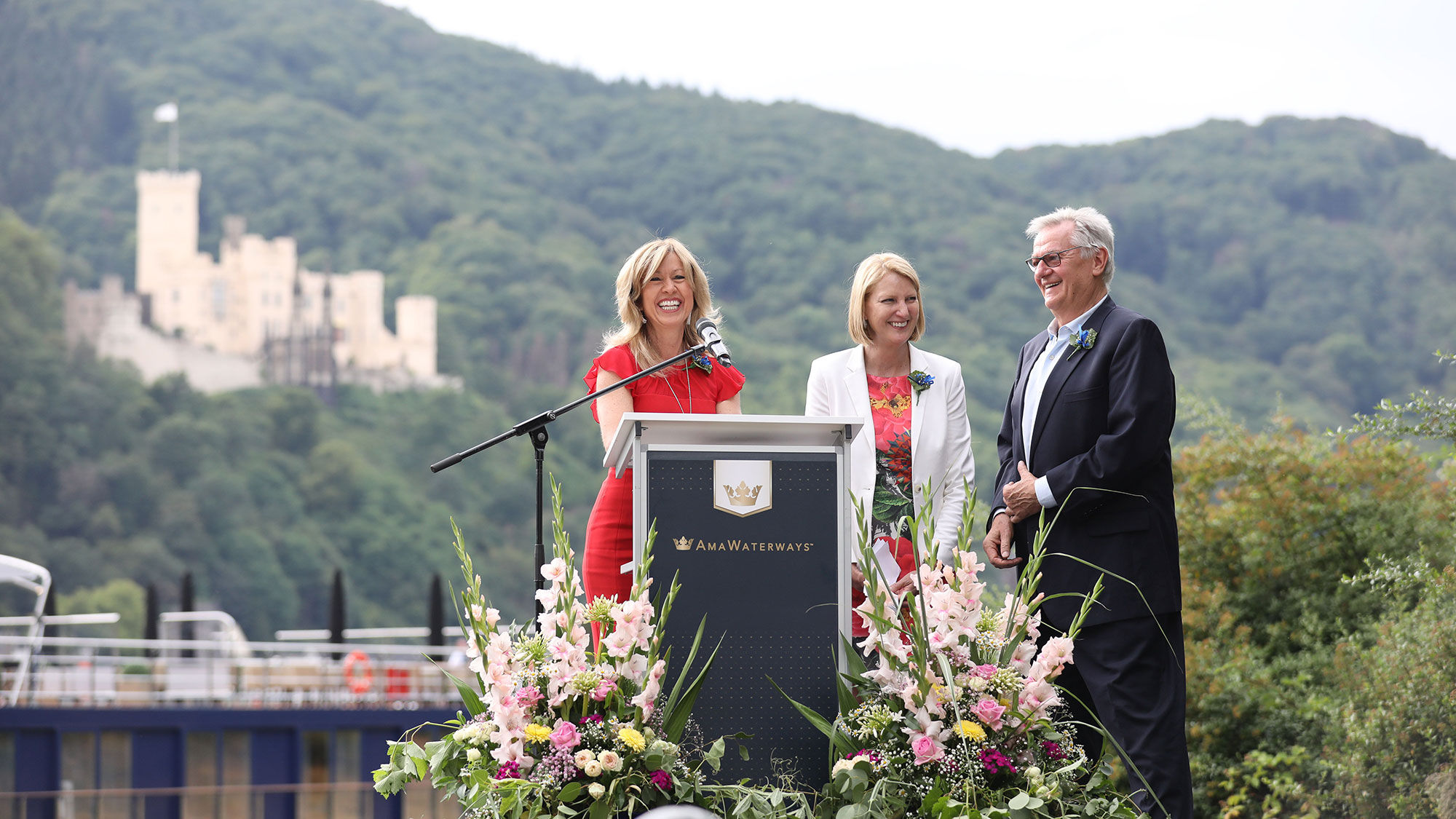 AmaMora godmother Libbie Rice flanked by AmaWaterways co-founders Kristin Karst and Rudi Schreiner.