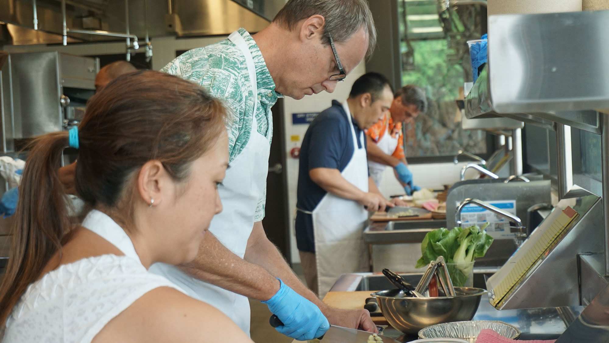 The new Culinarium experience at Kapiolani Community College pits teams against each other in a cooking challenge.