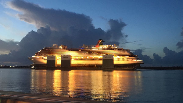 The Carnival Vista arrives at night in Grand Bahama after being picked up by the Boka Vanguard. The Carnival Vista arrives at night in Grand Bahama after being picked up by the Boka Vanguard.