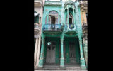 Classic buildings, many in states of disrepair, line the streets of Havana.