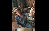 Cigar roller Ernesto grows the tobacco for his cigars in the fertile Vinales Valley.